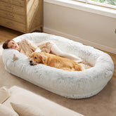 Bedsure cama humano-perro con refuerzo acolchado para cuello y cabeza.