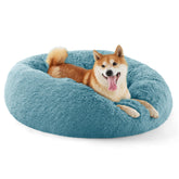 Bedsure cama-perro donut azul lavable aporta comodidad envolvente para dormir.