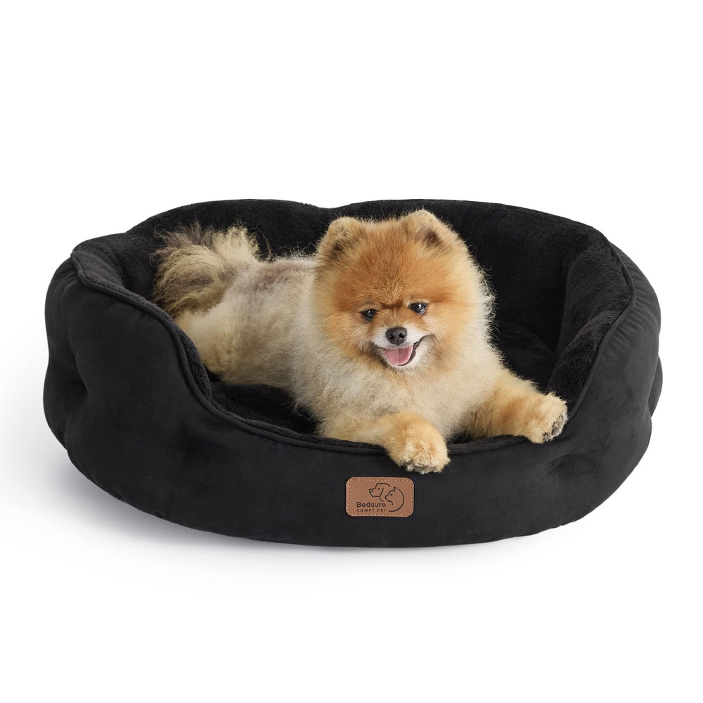 Bedsure cama para perro pequeño, diseño redondo y negro, ideal para siestas cómodas en casa.