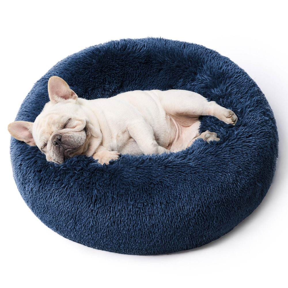 Bedsure Cama Donut Calma para perros pequeños en Navy, ideal para dormir acurrucado.