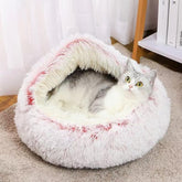 Cama redonda para mascotas con capucha rosa, comodidad y calor reconfortante para siestas.