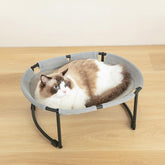 CatAve hamaca para gato con diseño ovalado, ideal para reposo cómodo.
