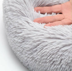 Catbeds borde acolchado ofrece apoyo para la cabeza y cuello.