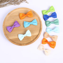 Clipband lazos múltiples colores para peluquería canina, combinan con tonos naturales del pelaje.