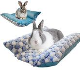 Cama Comfisit para conejo impermeable y reversible, ideal para descansos seguros.