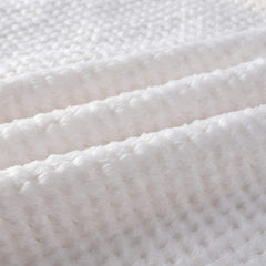 CUTEMATE manta diseño-marfil-tacto-plush, textura suave para relajación.