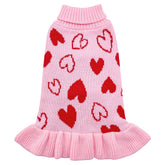 El suéter de cyeollo con corazón rosado brinda calidez suave para paseos invernales.