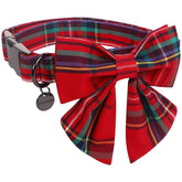 Collar DOGWONG navideño con lazo marinero rojo, ideal para paseos festivos.