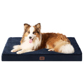 Cama ortopédica EHEYCIGA XL en azul marino dentro de jaula para perros grandes.