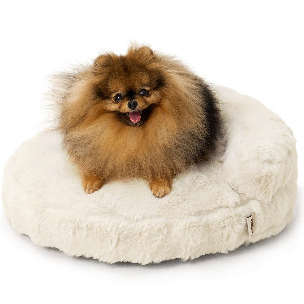 Sofá cama para gatos EHEYCIGA en crema, cómodo y acogedor.