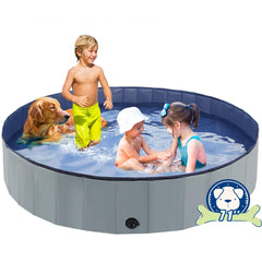Piscina para perros plegable Eooqi de 71 pulgadas desplegada en jardín para baño.