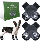EXPAWLORER calcetines para perros, vista frontal sobre suelo de madera, ayudan a evitar deslizamientos.