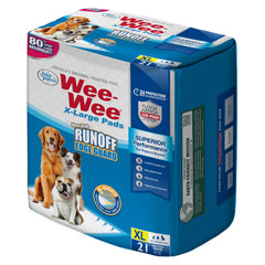 Pad de entrenamiento Wee-Wee de Four Paws con protección de 4 lados para suelos secos.
