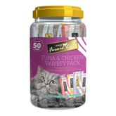 Fussie Cat purée en tubo, variedad 50, atún y pollo, ideal para enriquecer la hora de comer.