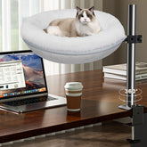 Cama para gato Gomyrod en escritorio, reposo cómodo para tu jornada laboral.
