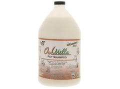 Envase de Groomers Edge OATMELLA; shampoo concentrado para diluir y cuidar la piel sensible.