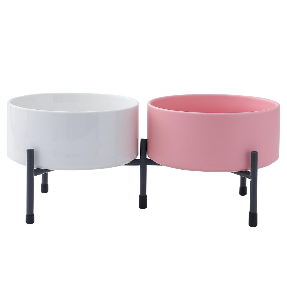 Tazones cerámicos para perro HANJION en rosa y blanco sobre base elevada.