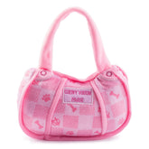 Haute Diggity Dog Chewy Vuiton rosa con cuadros, ideal para juego interactivo.
