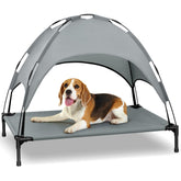 Cama para perro Heeyoo elevada con dosel, sombra y descanso al aire libre.
