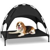 Cama de perro elevada Heeyoo con dosel para descanso fresco al aire libre.