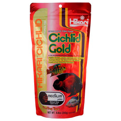 Hikari Cichlid Gold gránulos en empaque, alimentación diaria para cíclidos.