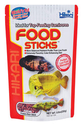 Hikari Palitos Tropicales 250 g: primer plano de los palitos para acuario, alimento seguro para peces.