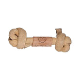 HuggleHounds Huggle-Hide Knotted Bone en cuero, vista frontal para masticadores activos.