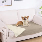 Manta hyha impermeable para perros sobre el sofá protege ante salpicaduras.