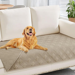 Manta hyha impermeable para perros en sofá, protege salpicaduras y pelo.