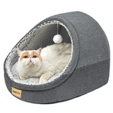 Cama Jiupety para gato en interior cueva; refugio cómodo para descansar.