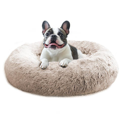Cama donut JOLLYVOGUE con textura felpa suave para descanso reconfortante.