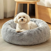 Cama JOLLYVOGUE para perros, diseño donut suave y reconfortante para su descanso.