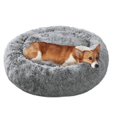 Cama para perros JOLLYVOGUE con donut suave ofrece confort envolvente para siestas