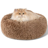 Cama donut suave de Kimpets ofrece confort envolvente para tu perro.