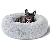 Cama Kimpets para perro, forma redonda donut, suave y lavable para mayor confort.