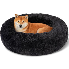 Cama Kimpets para perro redonda en negro, descanso cómodo y envolvente.