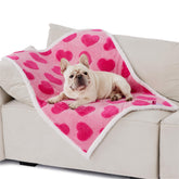 Manta impermeable LE SURE rosa, reversible para sofá y cama.