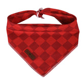 Bandana navidad Lionet Paws en algodón rojo a cuadros, ideal para paseos festivos.