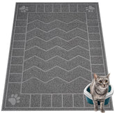 Alfombra Motsamla para arena de gato 47x35 captura la arena y facilita la limpieza.