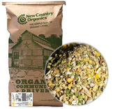 New Country Organics alimento para ponedoras en bolsa de 50 libras para nutrición equilibrada.