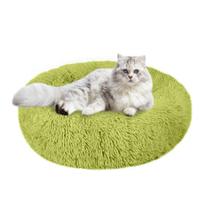 Cama Nisrada para gatos, diseño redondo y suave, ideal para siestas cómodas.