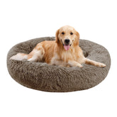 Cama Nisrada para perros, diseño redondo suave para descanso cómodo en casa.