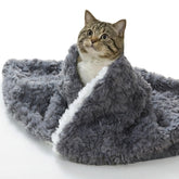 NODARKO manta gato pelo de conejo cepillado, ideal para siestas cálidas.