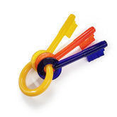 Nylabone Puppy Teething Keys en primer plano alivia encías de cachorros y promueve mordisqueo seguro