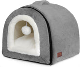 La cama OMIVIER para gato interior plegable con cueva gris oscuro ofrece refugio cómodo.