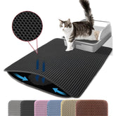 Petinstinct alfombrilla para arena de gato frente a la caja, reduce desorden diario.
