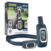 PetSafe entrenador remoto 300-yardas en mano para entrenamiento al aire libre.