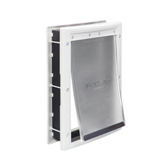 PetSafe Puerta Plástica para Mascotas instalada en puerta de madera, instalación rápida