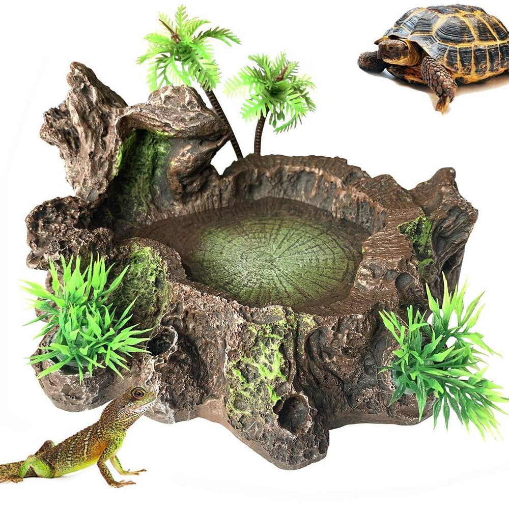 Bebedero PINVNBY con plantas artificiales para un terrario más natural.