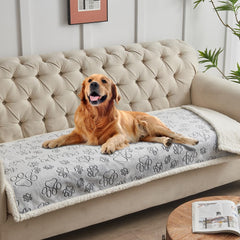 QEILS manta gris con huellas protege muebles gracias a su membrana impermeable.
